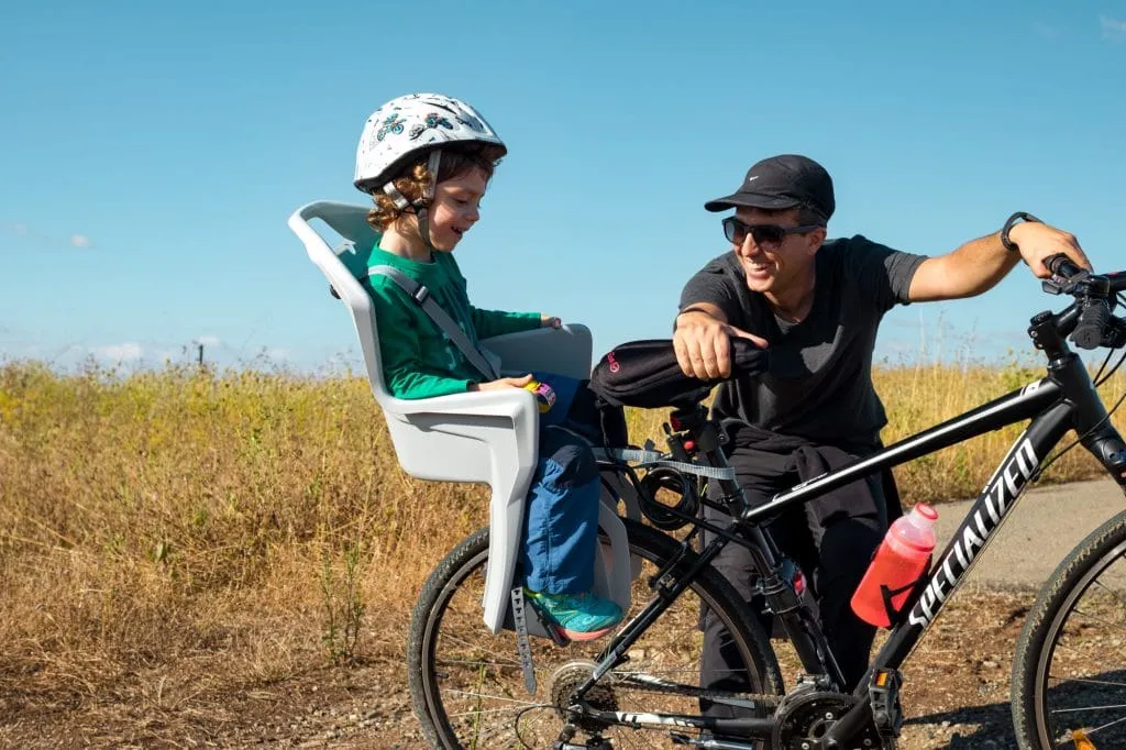Back mounted child bicycle seat, our son hates it 3 bike child seat
