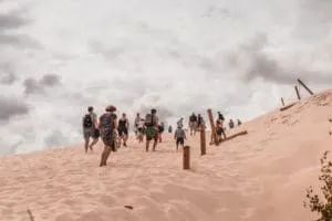 tourists in the dunes