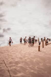 tourists in the dunes