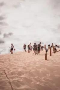 tourists in the dunes
