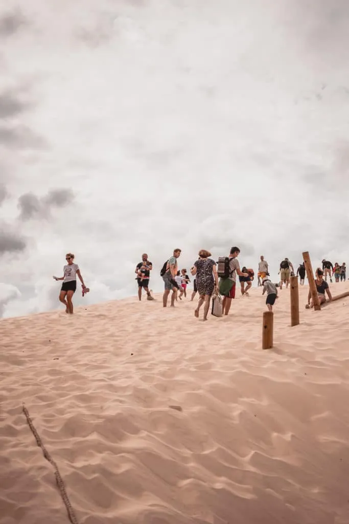 tourists in the dunes