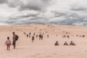 tourists in the dunes