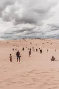 tourists in the dunes