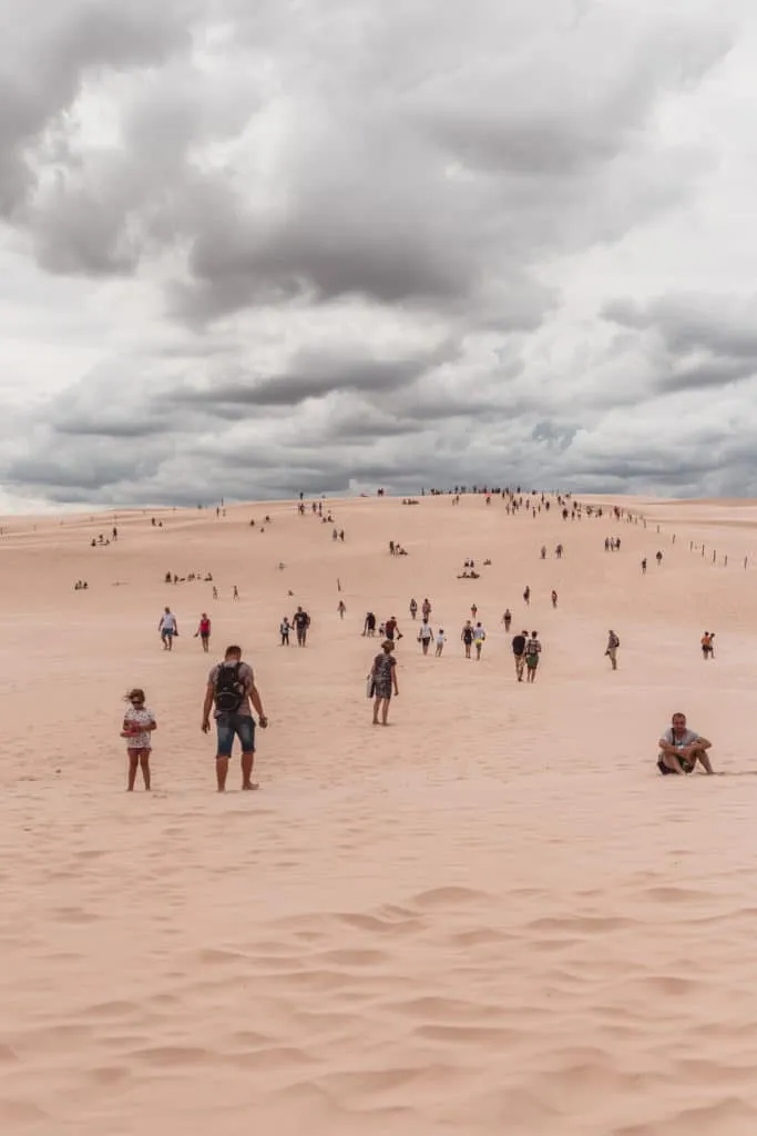 tourists in the dunes
