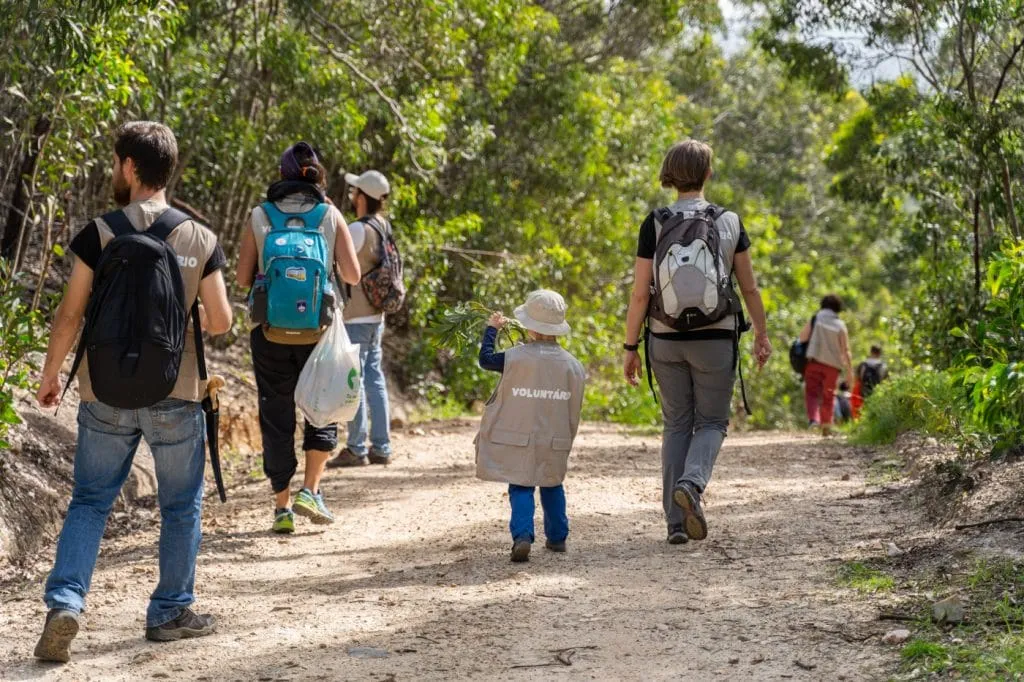kid walking in a trail