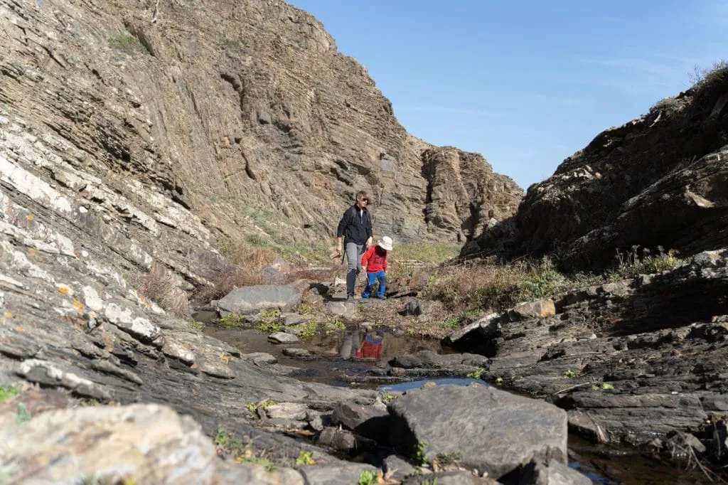walking near a river in rota vicentina