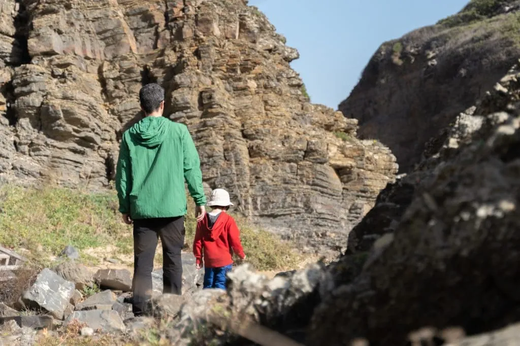dad and son exploring