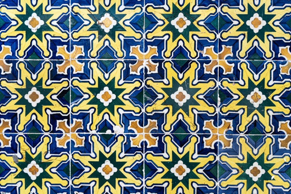 yellow, green, orange and blue portuguese tile